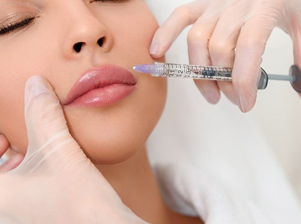 woman getting lip injections