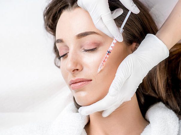 woman getting facial fillers