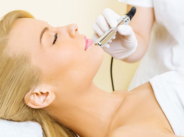 woman getting a non-surgical face treatment