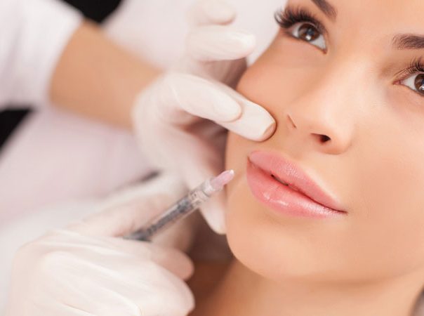 woman getting lip injections