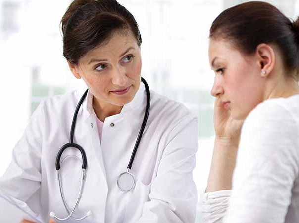female doctor and patient speaking