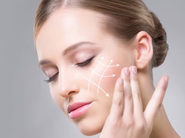 diagram on woman's cheek